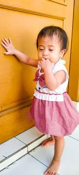 Active One Year Old Toddler Playing on House Doorstep Floor Stock Photos