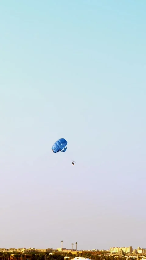 Active parasailing over the sea. one of the types of outdoor activities, Stock Footage 323087526