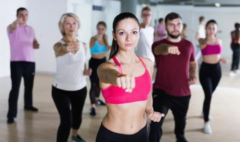 Active people of different ages practice sport dance Foto stock