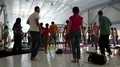 Active people makes dancing moves in group classes in gym HD Footage