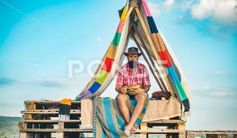 Active people. Summer camp. Play tent. Camping. Camping and tent near beautiful Stock Photos