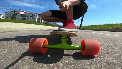 Active person skating on longboard Stock Footage 125017423