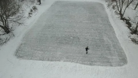 Active recreation in winter. ice skating on a nice winter day Stock Footage 219688243