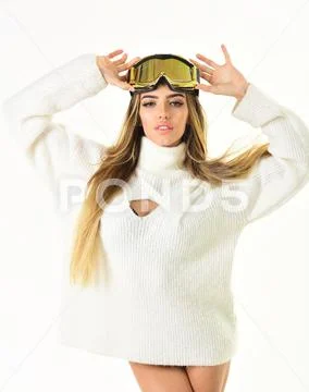 Active rest. Cheerful winter girl. Girl in ski or snowboard wear. Winter sport Stock Photos
