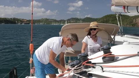 An active senior couple sailing 10 Stock Footage 99327810