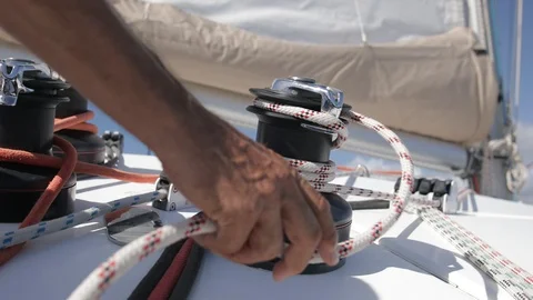 An active senior couple sailing 15 99329068