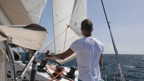 An active senior couple sailing 23 Stock Footage 99331287