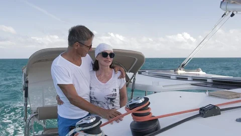 An active senior couple sailing 26 Stock Footage 99332135