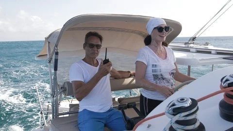 An active senior couple sailing 36 Stock Footage 99334744