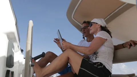 An active senior couple sailing 51 Stock Footage 99337638
