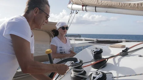 An active senior couple sailing 58 Stock Footage 99338842