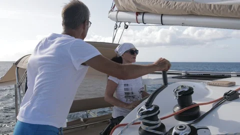 An active senior couple sailing 59 Stock Footage 99339153