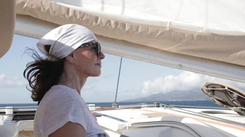 An active senior couple sailing 63 Stock Footage 99339709