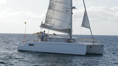 An active senior couple sailing 66 Stock Footage 99340413