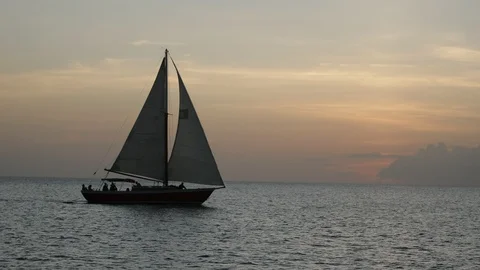 An active senior couple sailing 67 Stockbeeldmateriaal 99340657