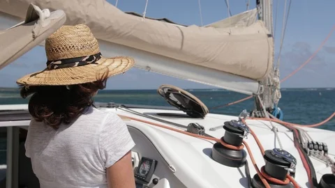An active senior couple sailing 7 Stock Footage 99327276