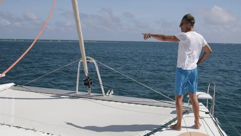 An active senior couple sailing 8 Stock Footage 99327409