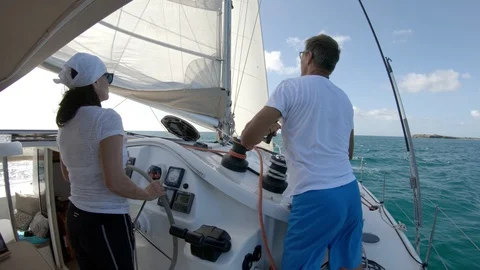 An active senior couple sailing 81 Stock Footage 99343519