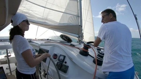 An active senior couple sailing 82 Stock Footage 99343665