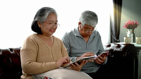 Active Senior Couple With Technology Stock Footage 118115948