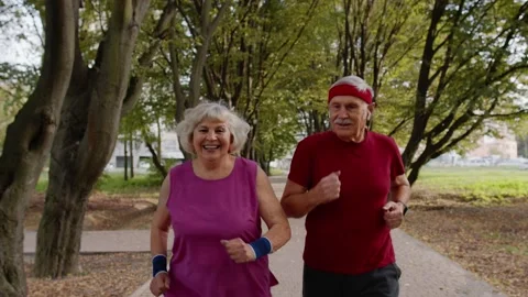 Active senior elderly couple doing cardio morning exercise workout. Man, woman Vídeos de archivo 139661958