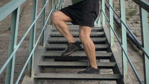 Active senior man doing exercises on iron stairs. Active leisure. Видео 116328127