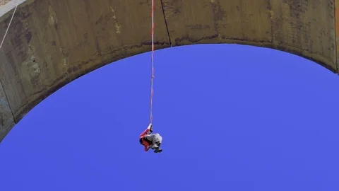 Active Seniors Rope jumping from high altitude of Bunovo bridge. Brave mature Stock Footage 112302944