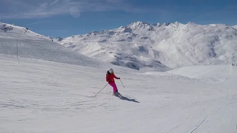 Active Skier Slowly Skiing Down From The Mountain Slopes In Winter On Alpine Ski Stock Footage 94268240