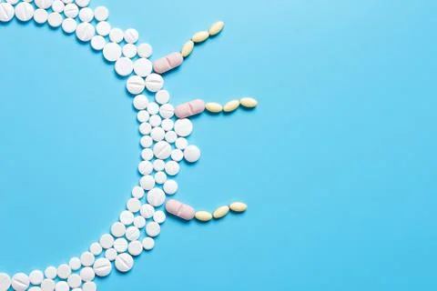 Active sperm cells swim to the egg on a blue background Stock Photos