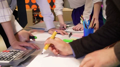 Active teamwork of young energetic colleagues, working and brainstorming Stock Footage 82581803