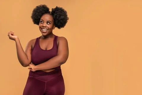 Active two plus size women after training in fashionable sporty clothes posin Fotos de archivo