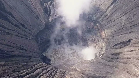 Active Volcano and Tourists on the Caldera. Aerial View 動画素材 106452891