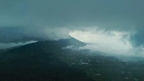 Active volcano Batur drone view of the village Stock Footage 274780979
