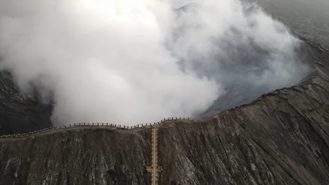Active volcano Bromo crater caldera volcanic landscape aerial drone Java Stock Footage 312425784