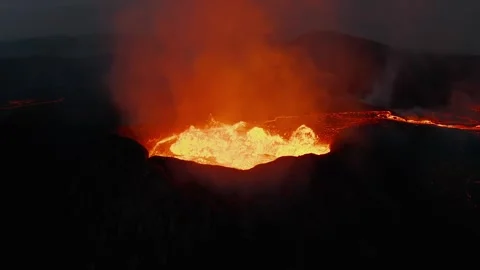 Active Volcano Crater Overflowing with Glowing Lava River Aerial Stock Footage 322180122