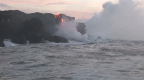 Active volcano disgorging hot lava Stock Footage 44672256