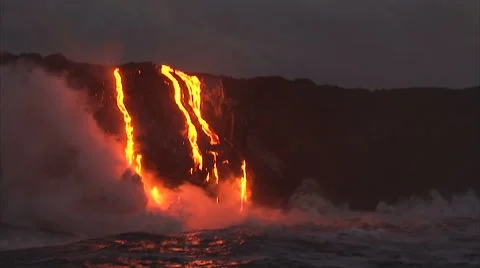 Active volcano disgorging hot lava Stock Footage 45794602