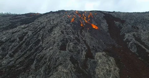 Active Volcano Leaking Lava | 4K Drone Dolly-in Stock Footage 88306754