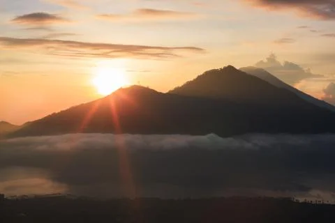 Active volcano. Sunrise from the top of Mount Batur - Bali, Indonesia Stock Photos