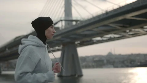 Active woman in hijab using smart tracker during cardio Stock Footage 156077217