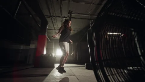 Active Woman Skipping Rope during Cardio Workout in Boxing Gym Видео 340387083