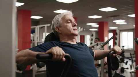 Active Work Out of 50s Old Man at Sport Hall or Fitness Center. Portrait of Heal Video stock 199478887
