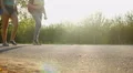 Active young friends walking in the park together, happy students hanging out HD Footage