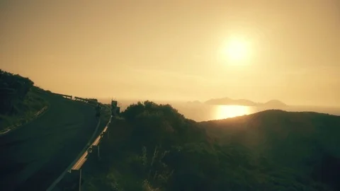 Active young man running on asphalt road on a mountain on Ponza island with view 스톡 동영상 84189318