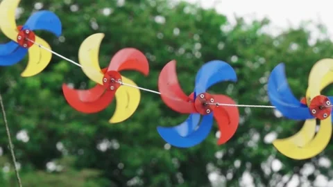 Actively spinning wind spinners hung overhead (50fps) 스톡 동영상 296364239