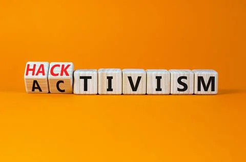 Activism or hacktivism symbol. Turned wooden cubes and changed the concept wo Stock-Fotos