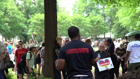 Activist speaking through a megaphone during protest in Atlanta Stock Footage 76835925