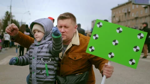 Activists family protesting against state police injustice violence on streets. Video stock 166283247