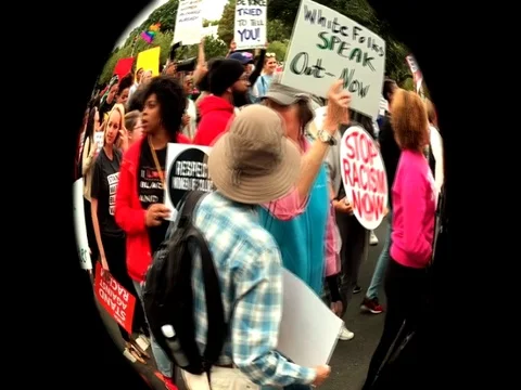 Activists march in support of NFL players in Washington, DC. Stock Footage 80722394