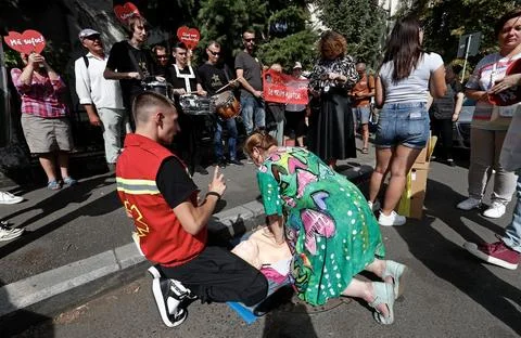 Activists protest to demand introduction of first aid courses in Romanian school Stock Photos